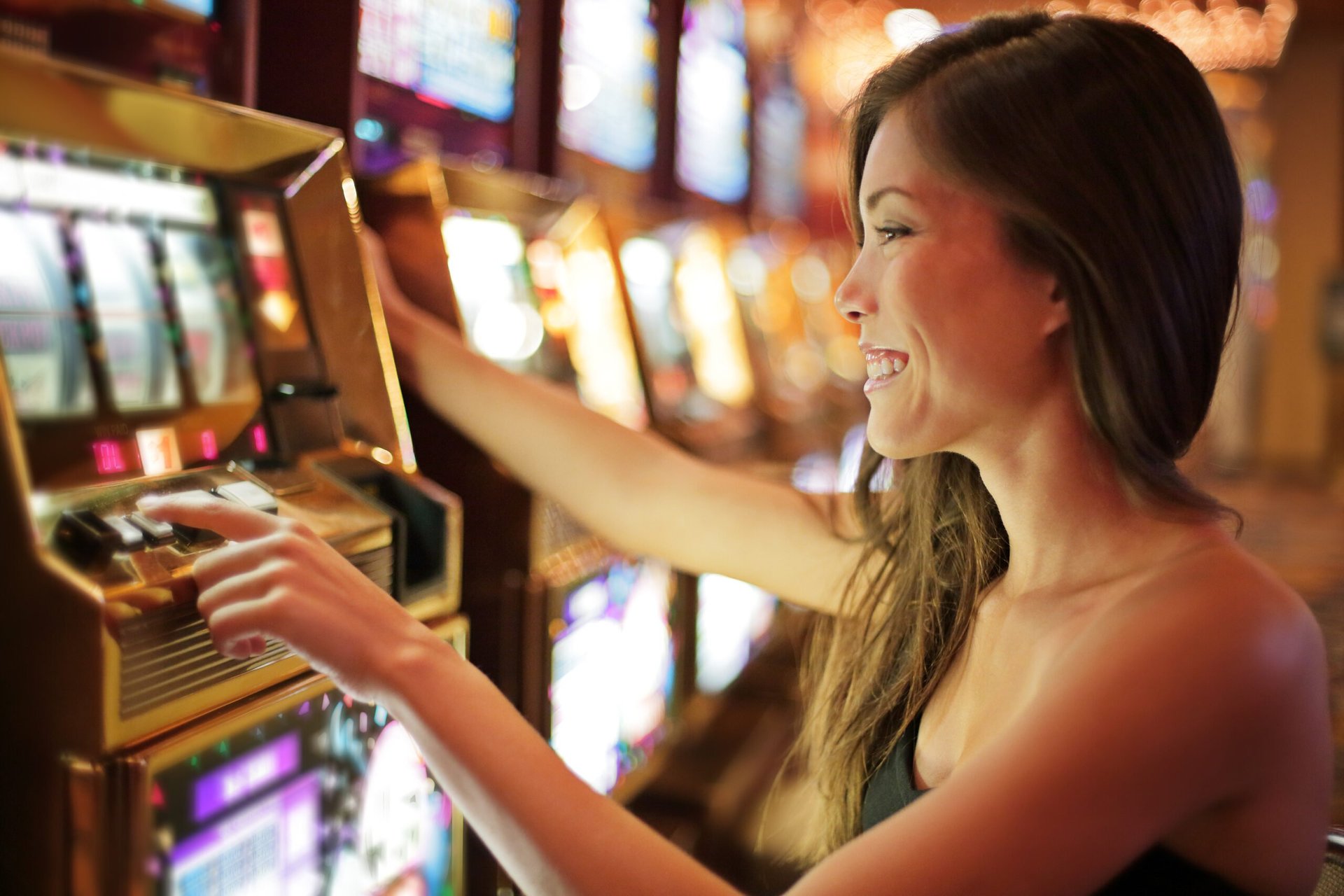 Woman playing slot machines