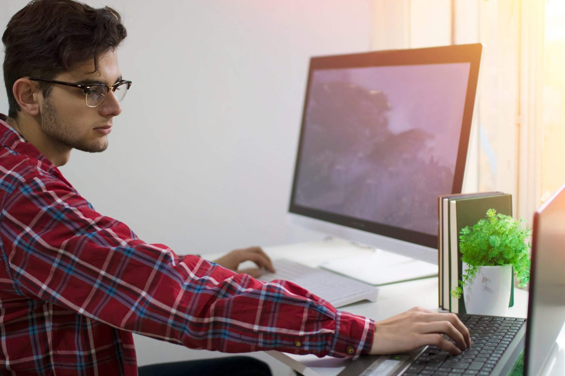 Guy working on a computer